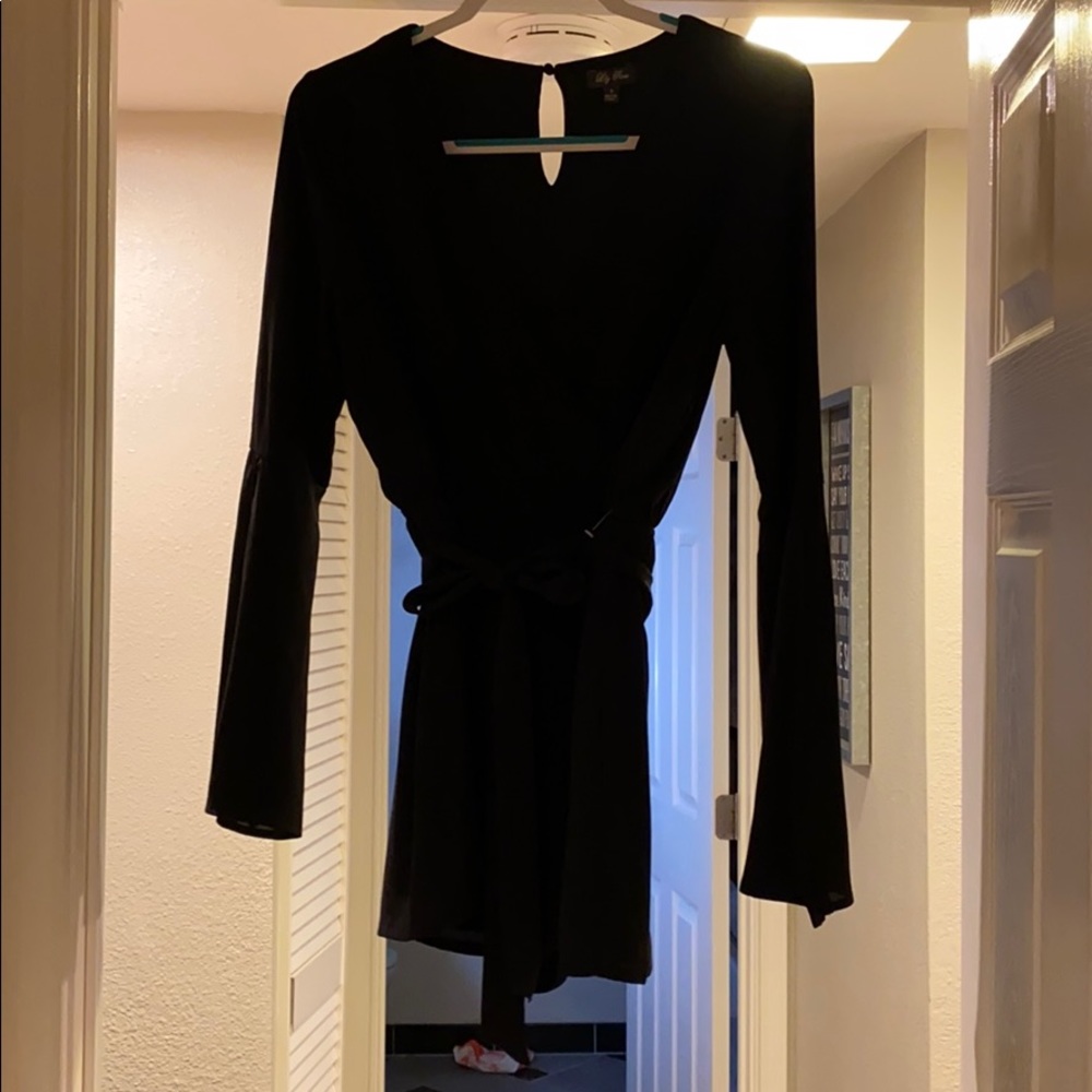 Never worn black long bell sleeve romper